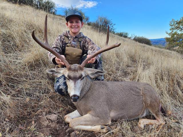 Hunter with a trophy Central Coast blacktail buck