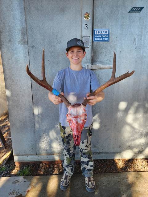 Hunter with a trophy Central Coast blacktail buck