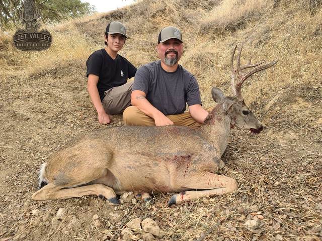 Hunter with a trophy Central Coast blacktail buck