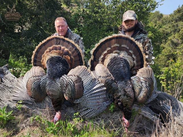 Hunter with a Rio Grande tom taken in the oaks