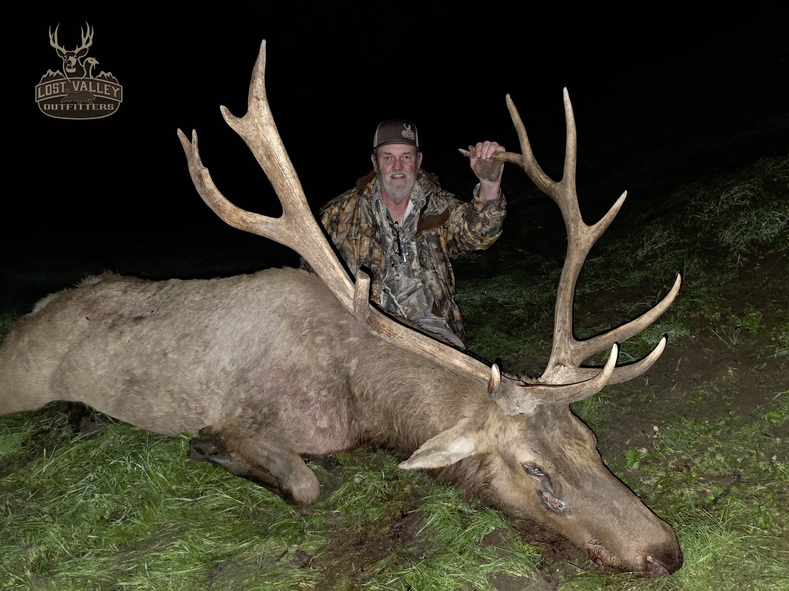Hunter with a trophy Tule elk bull taken in the Gabilan Range with Lost Valley Outfitters
