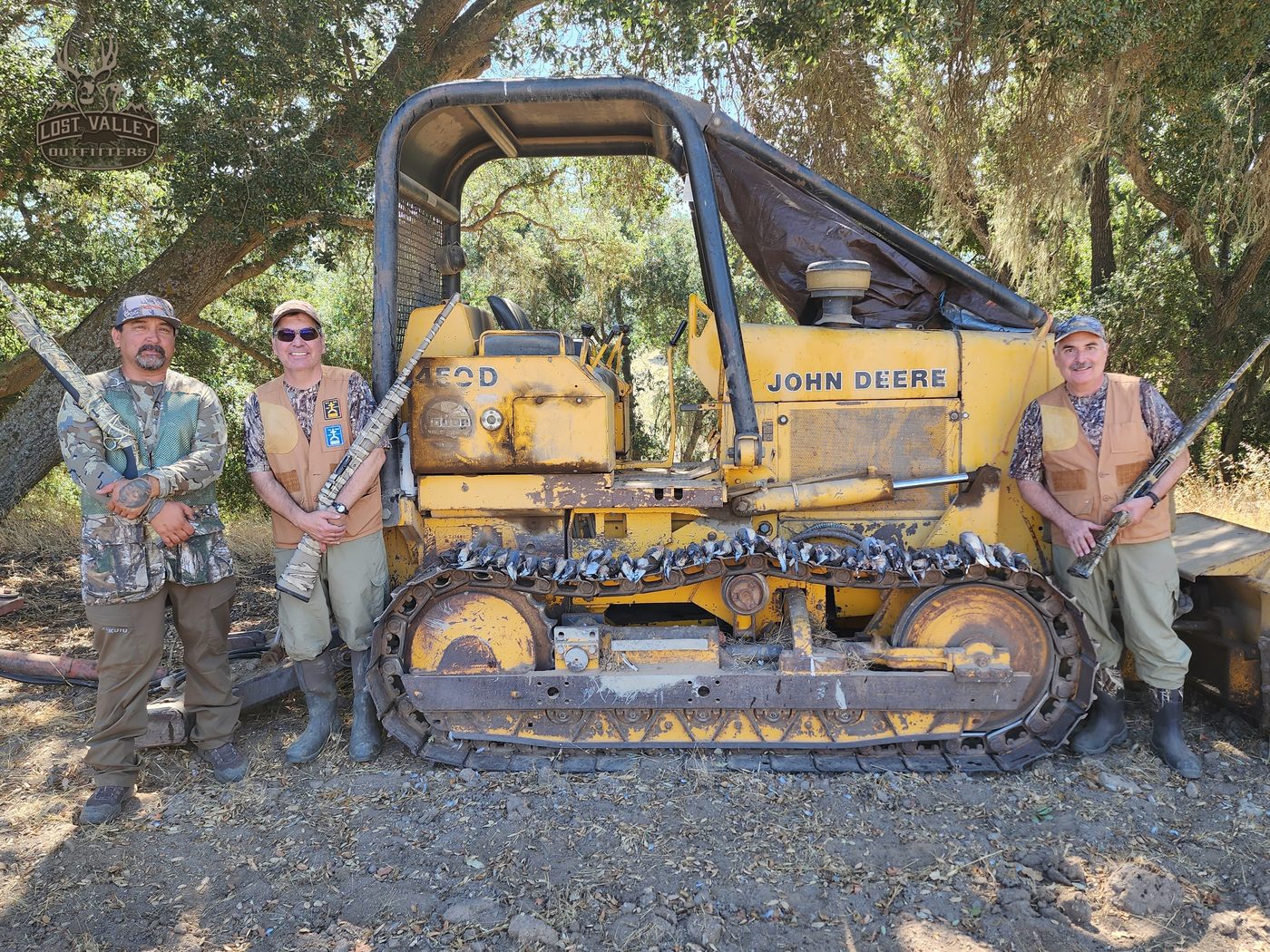 Upland hunters with a line of Central Coast birds after a morning shoot